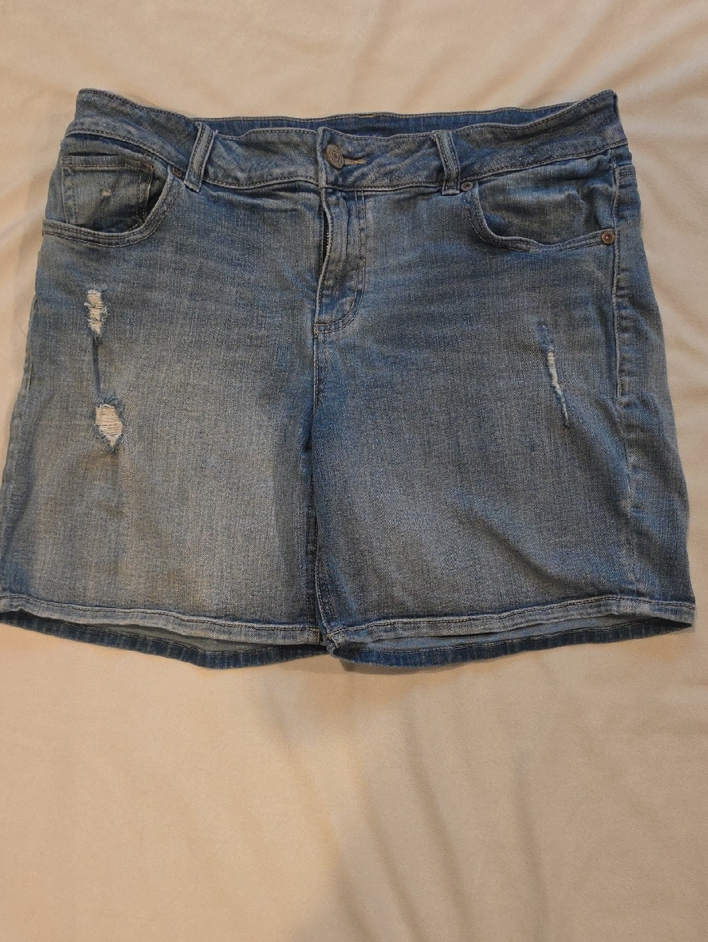 Maurices Lt Denim Distressed Shorts.